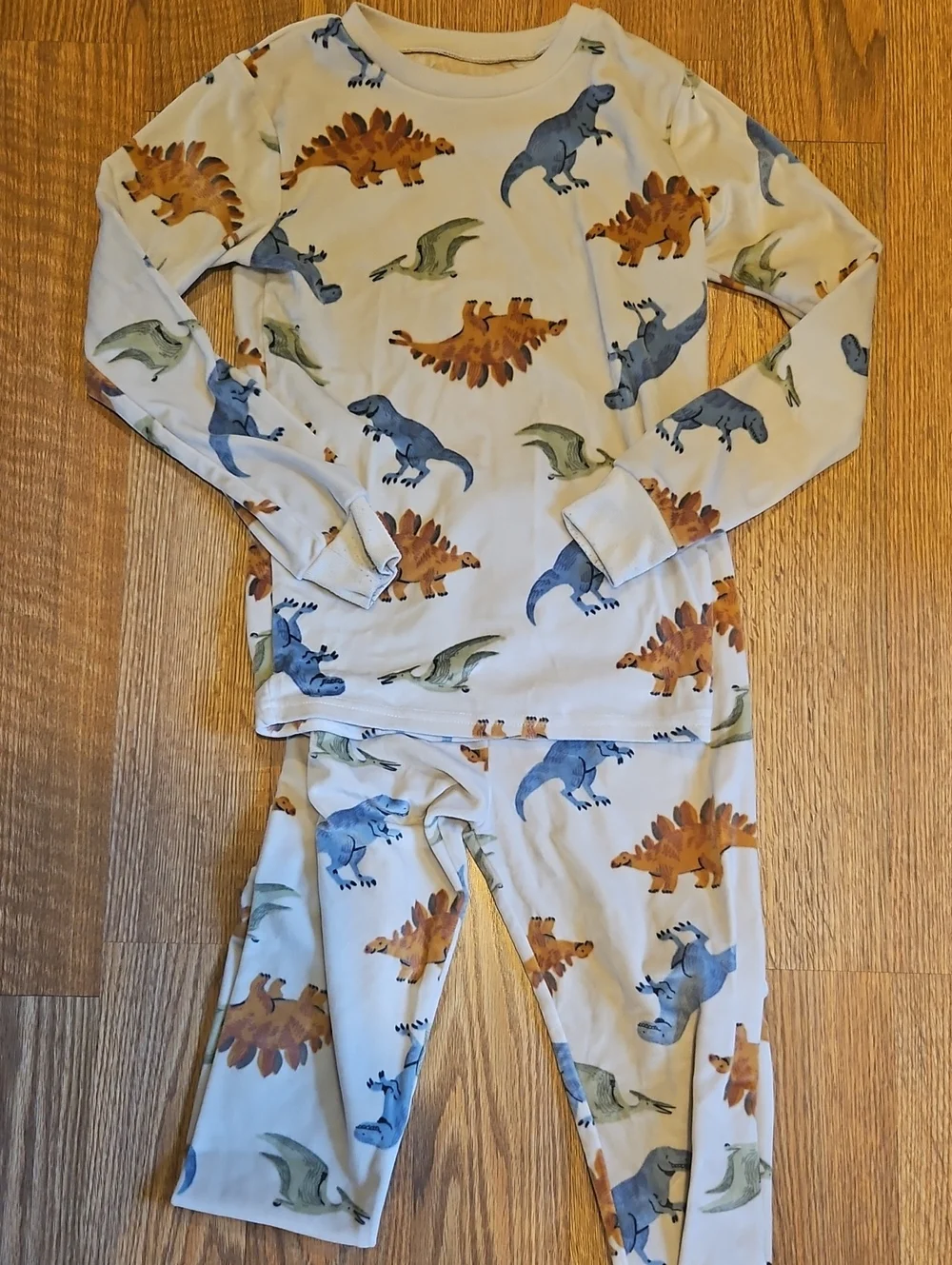 Carter's Cream Dinosaur Pajama Set with Blue, Green & Brown Prints